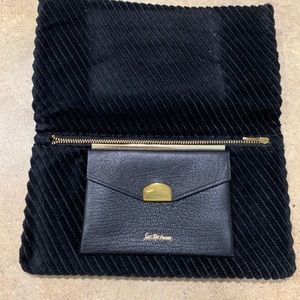 Sacks Fifth Avenue leather clutch